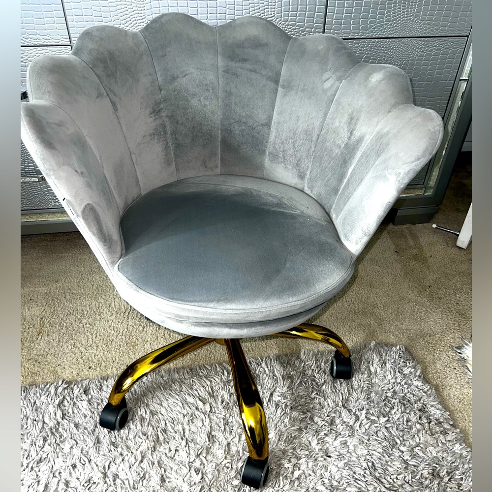 Lightly used vanity makeup mirror chair, suede, gray and in great use.